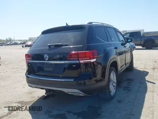 2019 Volkswagen Atlas SE z VIN 1V2WR2CA4KC595211, wystawiony jako IAAI lot #41986643 z przebiegiem 96 299 mil mil oraz . Historia ofert i sprzedaży dostępna na DreamBid. Obrazek 4.