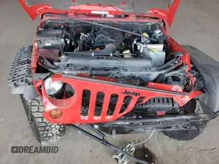 2012 Jeep Wrangler Unlimited Call of Duty MW3 with VIN 1C4BJWFGXCL225459, listed as a Copart auction lot 60699895 with 98,196 mi miles and Salvage title. Bid and sale history available at DreamBid. Image 11.