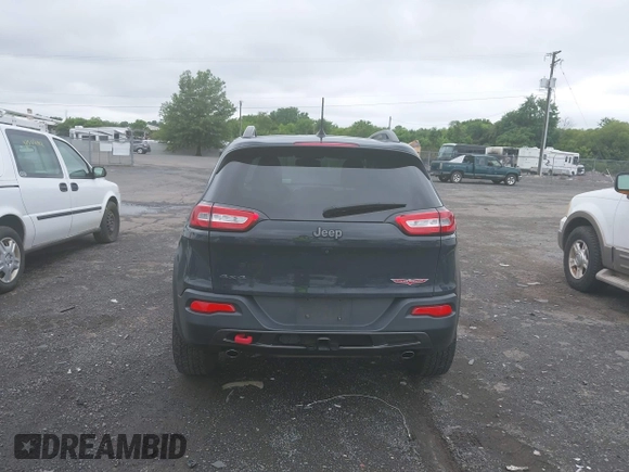 2017 Jeep Cherokee Trailhawk z VIN 1C4PJMBS2HW532974, wystawiony jako IAAI lot #42523785 z przebiegiem 74 272 mil mil oraz . Historia ofert i sprzedaży dostępna na DreamBid. Obrazek 16.