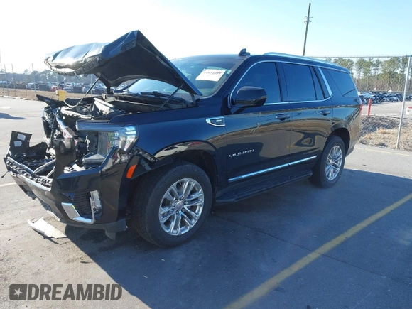 2021 GMC Yukon SLT with VIN 1GKS1BKD0MR199154, listed as a IAAI auction lot 41654239 with 105,357 mi miles. Bid and sale history available at carsss.com. Image 21.