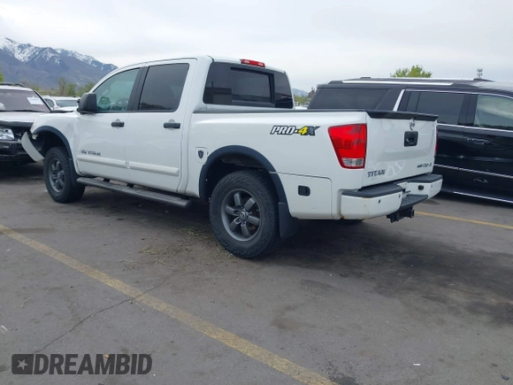2014 Nissan Titan Pro-4X with VIN 1N6BA0ECXEN501915, listed as a IAAI auction lot 42097967 with 120,851 mi miles and . Bid and sale history available at DreamBid. Image 3.