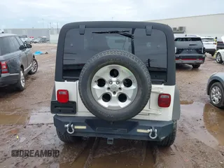 2003 Jeep Wrangler Sport with VIN 1J4FA49S43P362339, listed as a IAAI auction lot 41452901 with 208,128 mi miles and . Bid and sale history available at DreamBid. Image 17.