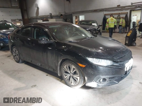 2016 Honda Civic Sedan EX-L with VIN 19XFC1F75GE210803, listed as a IAAI auction lot 41424370 with 111,848 mi miles. Bid and sale history available at carsss.com. Image 1.