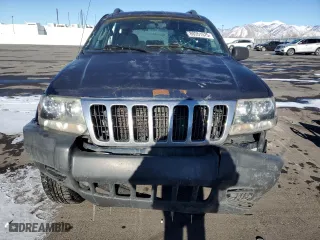 2004 Jeep Grand Cherokee Laredo with VIN 1J4GW48S44C325808, listed as a Copart auction lot 89351575 with 312,011 mi miles and Salvage Title. Bid and sale history available at carsss.com. Image 5.