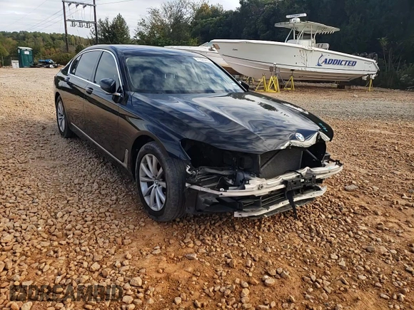 2018 BMW 7 Series 740i xDrive with VIN WBA7E4C5XJGV24003, listed as a Copart auction lot 71395443 with 63,558 mi miles. Bid and sale history available at carsss.com. Image 11.