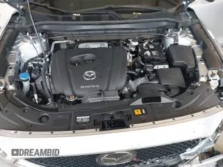2020 Mazda CX-5 Grand Touring with VIN JM3KFADM0L0738693, listed as a IAAI auction lot 41725906 with 63,629 mi miles. Bid and sale history available at carsss.com. Image 10.