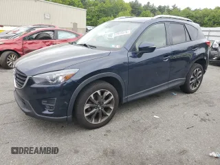 2016 Mazda CX-5 Grand Touring z VIN JM3KE4DY6G0832087, wystawiony jako Copart lot #57816515 z przebiegiem 127 293 mil mil oraz Szkoda całkowita • Salvage title. Historia ofert i sprzedaży dostępna na DreamBid. Obrazek 1.