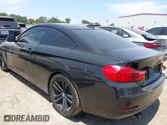 2014 BMW 4 Series 428i with VIN WBA3N3C54EF710642, listed as a IAAI auction lot 42319452 with 127,071 mi miles and . Bid and sale history available at DreamBid. Image 3.