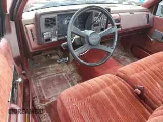 1990 GMC Sierra 1500 z VIN 1GTFC24K8LE514419, wystawiony jako Copart lot #57265335 z przebiegiem 162 045 mil mil oraz Szkoda całkowita • Salvage title. Historia ofert i sprzedaży dostępna na DreamBid. Obrazek 8.