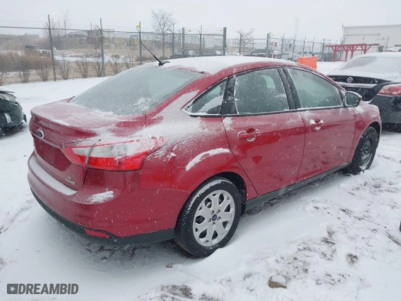 2012 Ford Focus SE with VIN 1FAHP3F26CL390748, listed as a IAAI auction lot 41571211 with 139,807 mi miles. Bid and sale history available at carsss.com. Image 4.