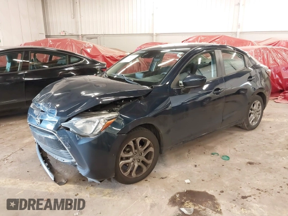 2016 Scion iA z VIN 3MYDLBZV5GY103533, wystawiony jako IAAI lot #41756270 z przebiegiem 59 290 mil mil oraz . Historia ofert i sprzedaży dostępna na DreamBid. Obrazek 22.
