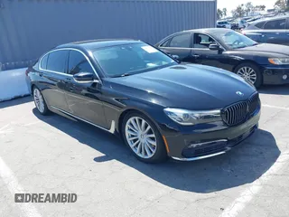 2016 BMW 7 Series 740i with VIN WBA7E2C59GG504595, listed as a IAAI auction lot 42829958 with Not provided miles and . Bid and sale history available at DreamBid. Image 1.