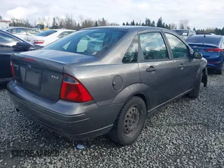 2006 Ford Focus S z VIN 1FAFP34NX6W179320, wystawiony jako IAAI lot #41937794 z przebiegiem 211 961 mil mil oraz . Historia ofert i sprzedaży dostępna na DreamBid. Obrazek 4.