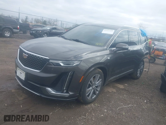 2020 Cadillac XT6 FWD Premium Luxury with VIN 1GYKPCRS0LZ136228, listed as a IAAI auction lot 41912953 with Not provided miles and . Bid and sale history available at DreamBid. Image 18.
