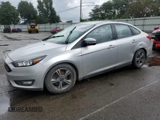2016 Ford Focus SE with VIN 1FADP3FE5GL233081, listed as a Copart auction lot 65498195 with 89,674 mi miles and Salvage title. Bid and sale history available at DreamBid. Image 1.