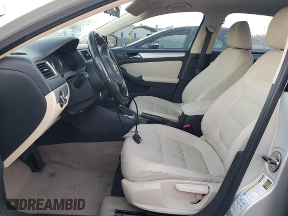 2012 Volkswagen Jetta Sedan SEL w/Sunroof with VIN 3VWLX7AJ7CM310458, listed as a Copart auction lot 87670525 with 142,944 mi miles and Salvage Title. Bid and sale history available at carsss.com. Image 7.