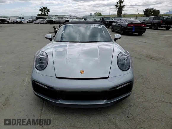 2020 Porsche 911 Carrera S z VIN WP0CB2A96LS263554, wystawiony jako Copart lot #52013384 z przebiegiem 8 702 mil mil oraz . Historia ofert i sprzedaży dostępna na DreamBid. Obrazek 11.