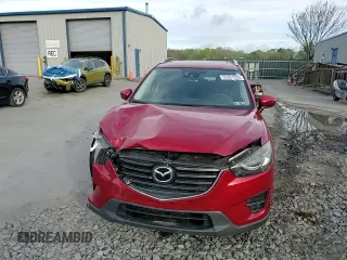 2016 Mazda CX-5 Grand Touring with VIN JM3KE4DY6G0753826, listed as a Copart auction lot 55391555 with 96,852 mi miles and Salvage Title. Bid and sale history available at DreamBid. Image 14.