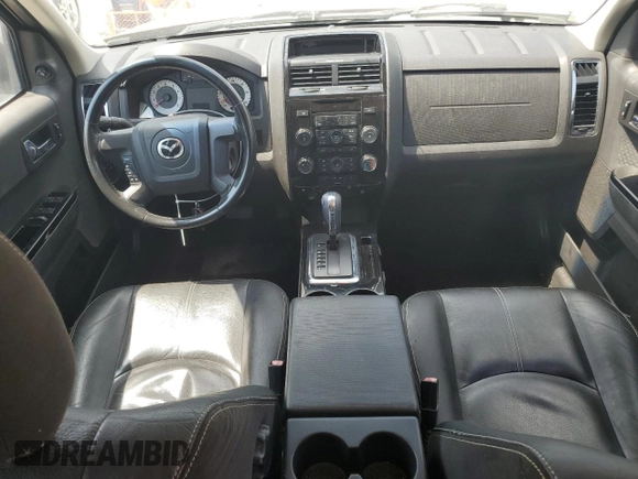 2008 Mazda Tribute Touring with VIN 4F2CZ96178KM28784, listed as a Copart auction lot 54736035 with 195,988 mi miles and Clean Title. Bid and sale history available at DreamBid. Image 8.