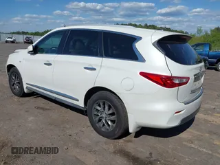 2015 Infiniti QX60 with VIN 5N1AL0MM1FC524964, listed as a IAAI auction lot 42010993 with 144,670 mi miles and . Bid and sale history available at DreamBid. Image 3.