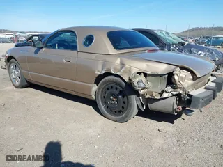 2005 Ford Thunderbird Deluxe with VIN 1FAHP60A45Y100899, listed as a IAAI auction lot 41803706 with 75,319 mi miles. Bid and sale history available at carsss.com. Image 3.