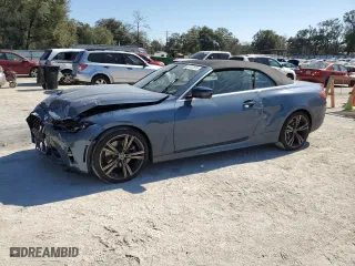 2024 BMW 4 Series 430i with VIN WBA23AT09RCP53441, listed as a Copart auction lot 44187675 with 9,297 mi miles and Salvage Title. Bid and sale history available at carsss.com. Image 1.
