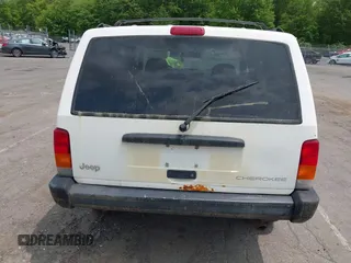 1998 Jeep Cherokee Sport z VIN 1J4FJ68SXWL243008, wystawiony jako IAAI lot #42411968 z przebiegiem 147 680 mil mil oraz . Historia ofert i sprzedaży dostępna na DreamBid. Obrazek 13.
