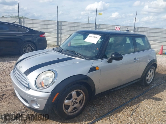 2008 MINI Hardtop with VIN WMWMF33578TU68033, listed as a IAAI auction lot 41939852 with 128,231 mi miles and . Bid and sale history available at DreamBid. Image 2.