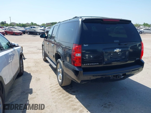 2011 Chevrolet Suburban LT with VIN 1GNSCJE09BR235355, listed as a IAAI auction lot 42030105 with 308,576 mi miles. Bid and sale history available at carsss.com. Image 3.