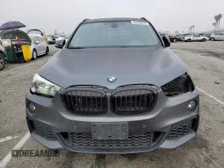 2017 BMW X1 xDrive28i with VIN WBXHT3C32H5F81619, listed as a Copart auction lot 49445533 with 88,439 mi miles. Bid and sale history available at carsss.com. Image 5.