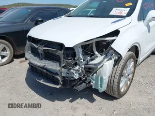 2016 Buick Envision Premium I with VIN LRBFXESX6GD235100, listed as a IAAI auction lot 41985343 with 51,376 mi miles and . Bid and sale history available at DreamBid. Image 6.