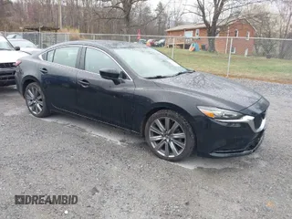 2018 Mazda Mazda6 Touring with VIN JM1GL1VM2J1313540, listed as a IAAI auction lot 41850108 with 142,831 mi miles. Bid and sale history available at carsss.com. Image 1.