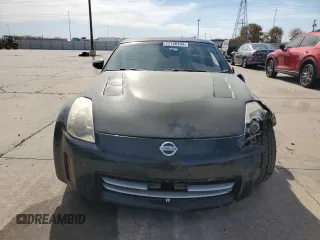 2007 Nissan 350Z with VIN JN1BZ34D97M504887, listed as a Copart auction lot 77140104 with 115,128 mi miles and Salvage Title. Bid and sale history available at DreamBid. Image 5.
