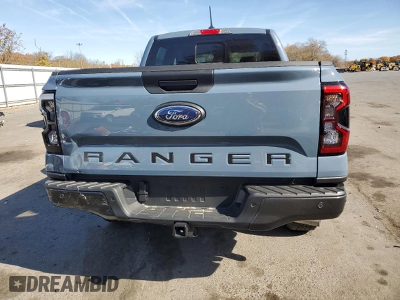 2024 Ford Ranger LARIAT with VIN 1FTER4KH3RLE18571, listed as a Copart auction lot 77970604 with 2,375 mi miles and Salvage Title. Bid and sale history available at carsss.com. Image 6.