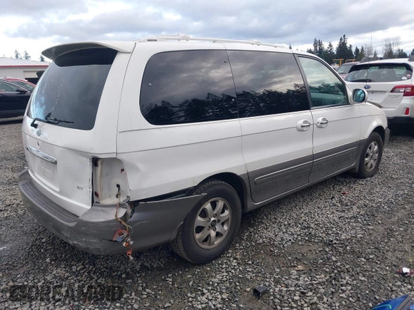 2005 Kia Sedona LX with VIN KNDUP132X56742698, listed as a IAAI auction lot 41637967 with 118,346 mi miles. Bid and sale history available at carsss.com. Image 4.