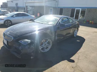 2012 BMW 6 Series 650i xDrive with VIN WBALX5C57CC893877, listed as a Copart auction lot 47870205 with 66,788 mi miles and Salvage Title. Bid and sale history available at carsss.com. Image 1.
