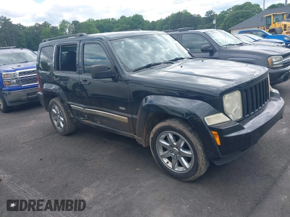 2012 Jeep Liberty Sport z VIN 1C4PJMAK4CW205955, wystawiony jako IAAI lot #42188882 z przebiegiem 196 411 mil mil oraz . Historia ofert i sprzedaży dostępna na DreamBid. Obrazek 1.