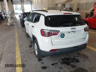 2018 Jeep Compass Sport with VIN 3C4NJCAB6JT124198, listed as a IAAI auction lot 41192196 with 104,557 mi miles. Bid and sale history available at carsss.com. Image 3.