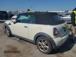 2013 MINI Convertible with VIN WMWZN3C58DT568824, listed as a IAAI auction lot 41998124 with 134,191 mi miles and . Bid and sale history available at DreamBid. Image 3.
