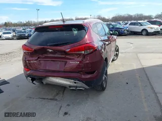 2017 Hyundai Tucson Value with VIN KM8J33A29HU390142, listed as a IAAI auction lot 41816840 with 55,750 mi miles. Bid and sale history available at carsss.com. Image 4.