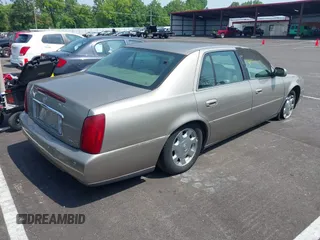 2002 Cadillac DeVille z VIN 1G6KD54Y12U219770, wystawiony jako IAAI lot #42474317 z przebiegiem 122 776 mil mil oraz . Historia ofert i sprzedaży dostępna na DreamBid. Obrazek 4.