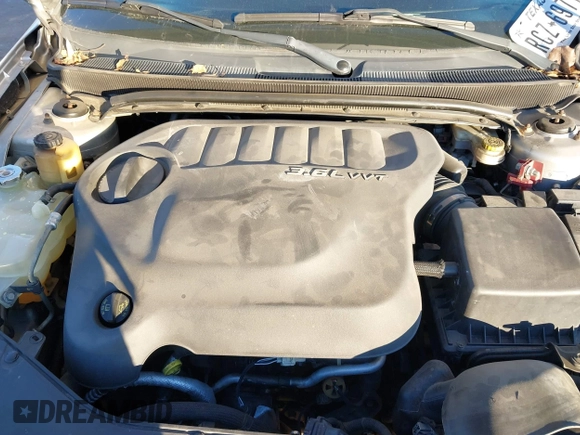 2012 Chrysler 200 S with VIN 1C3CCBHGXCN188538, listed as a IAAI auction lot 41085313 with 107,002 mi miles and . Bid and sale history available at DreamBid. Image 10.