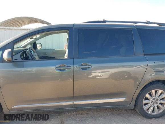 2012 Toyota Sienna LE with VIN 5TDJK3DCXCS039801, listed as a IAAI auction lot 41483248 with 165,548 mi miles. Bid and sale history available at carsss.com. Image 14.