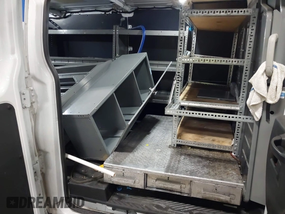 2018 Ford Transit with VIN 1FTYE1ZM6JKB50362, listed as a IAAI auction lot 41261638 with 151,266 mi miles and . Bid and sale history available at DreamBid. Image 8.