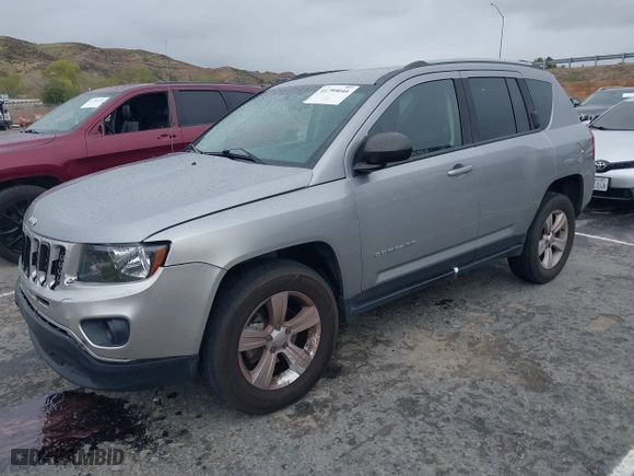 2016 Jeep Compass Sport with VIN 1C4NJDBB6GD781909, listed as a IAAI auction lot 41795044 with 101,821 mi miles. Bid and sale history available at carsss.com. Image 2.