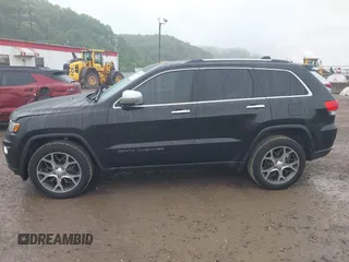 2019 Jeep Grand Cherokee Limited z VIN 1C4RJFBG7KC609265, wystawiony jako IAAI lot #42354587 z przebiegiem 105 986 mil mil oraz . Historia ofert i sprzedaży dostępna na DreamBid. Obrazek 14.