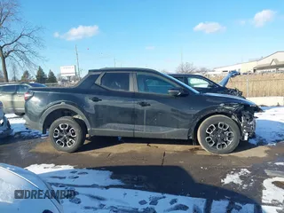 2022 Hyundai Santa Cruz SEL Premium z VIN 5NTJDDAF0NH037208, wystawiony jako IAAI lot #41536366 z przebiegiem 66 096 mil mil oraz . Historia ofert i sprzedaży dostępna na DreamBid. Obrazek 12.