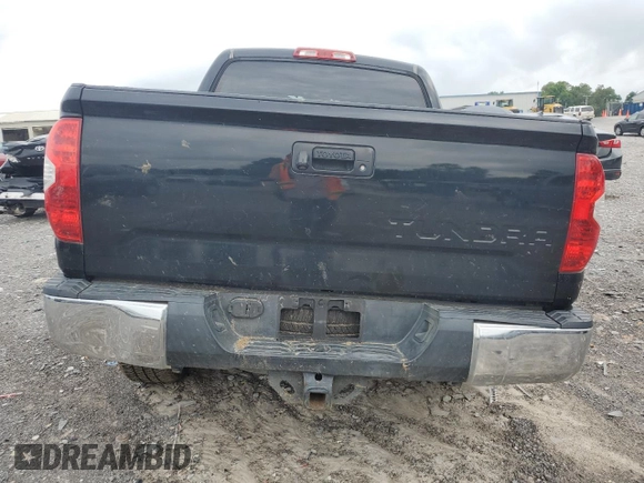 2014 Toyota Tundra SR5 with VIN 5TFEY5F14EX165589, listed as a Copart auction lot 57311785 with 165,343 mi miles and Salvage title. Bid and sale history available at DreamBid. Image 6.