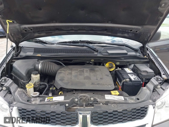 2019 Dodge Grand Caravan SE with VIN 2C4RDGBGXKR796974, listed as a IAAI auction lot 42008704 with 129,229 mi miles and . Bid and sale history available at DreamBid. Image 10.