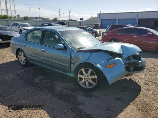 2002 Nissan Maxima GLE z VIN JN1DA31A92T302785, wystawiony jako Copart lot #57310725 z przebiegiem 95 192 mil mil oraz Szkoda całkowita • Salvage title. Historia ofert i sprzedaży dostępna na DreamBid. Obrazek 4.